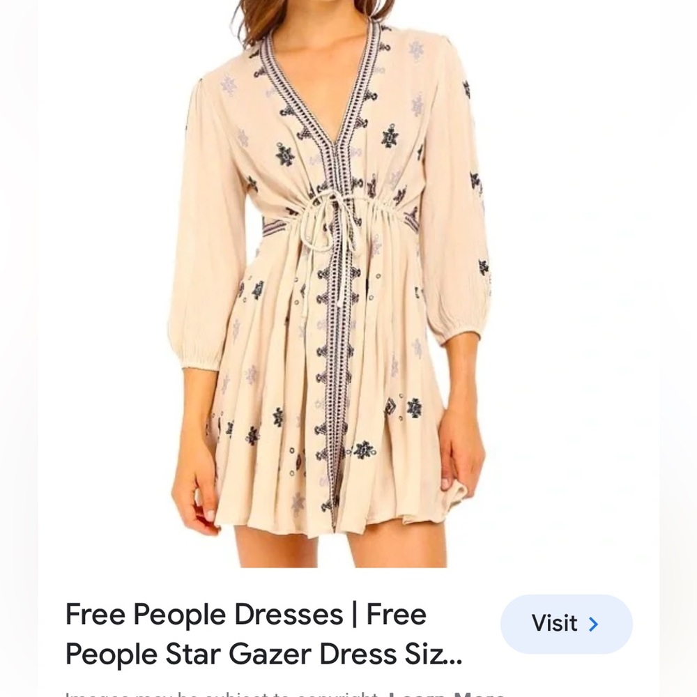 Free People dress with delicate details.